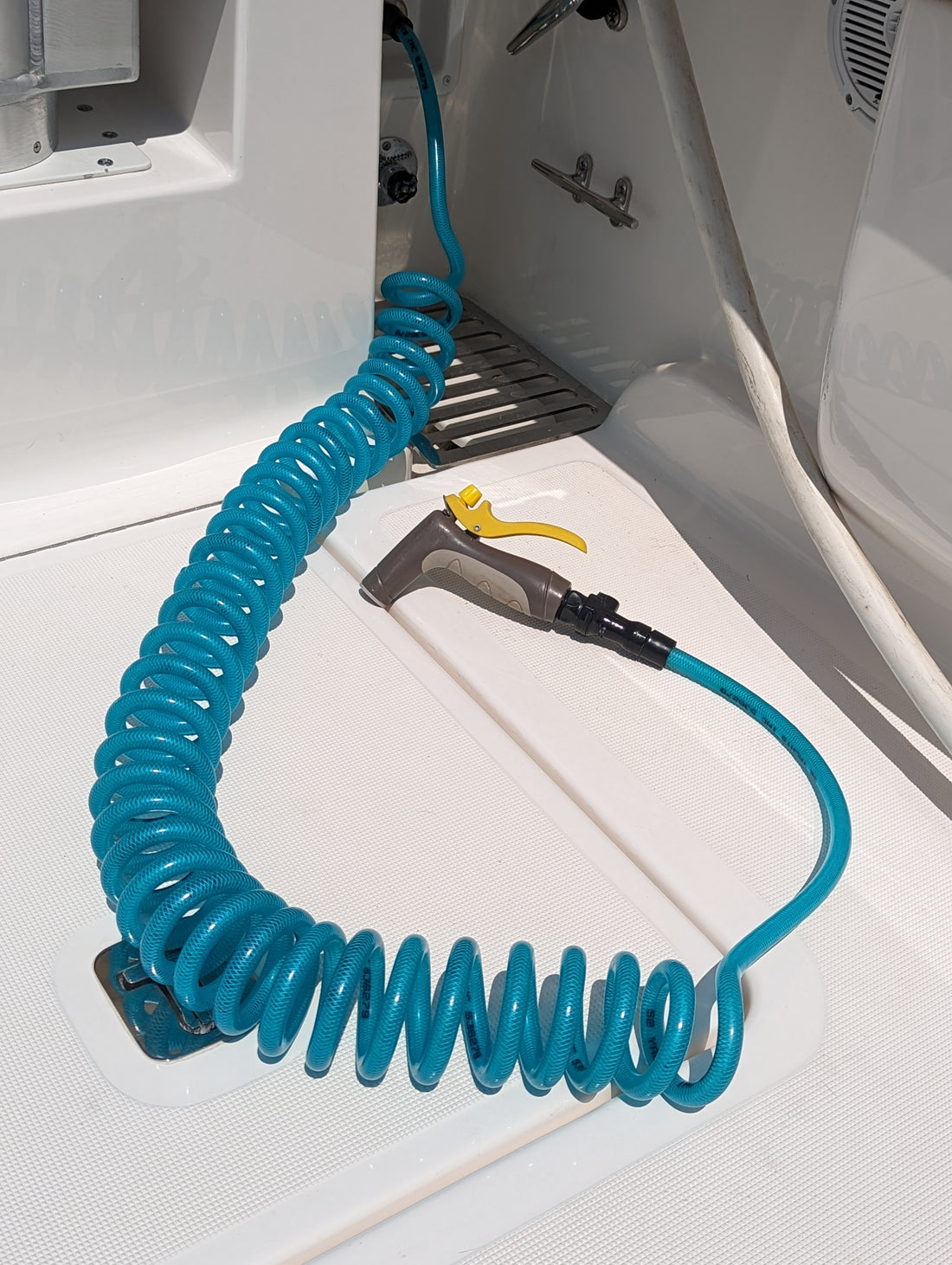 DE Marine boat coiled washdown hose assembly kit on a boat