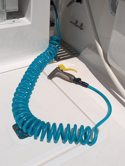 DE Marine boat coiled washdown hose assembly kit on a boat